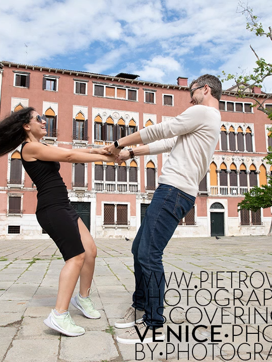 Happy couple having fun by holding hand spinning. Enjoy and respect Venice. #vacation #vacationitaly #vacationinitaly #couplevacation #travelvenice #couplelove #vacationphotographer #veniceitaly more info » https://www.pietrovolpato.com/