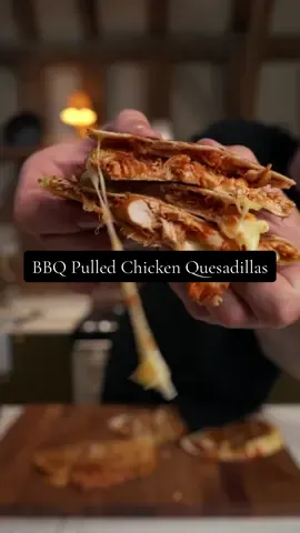 BBQ Pulled Chicken Quesadillas 🔥 •	2 large chicken breasts (approx. 300-350g) 	•	3 tbsp ketchup 	•	1 tbsp tomato purée 	•	1 tbsp brown sugar 	•	1 tbsp apple cider vinegar 	•	½ tsp smoked paprika 	•	½ tsp garlic granules 	•	Pinch of salt 	•	Splash of water (1–2 tbsp, as needed) For the Quesadillas 	•	4 large tortilla wraps 	•	4 slices Emmental cheese (or any cheese you’ve got: cheddar, mozzarella, Red Leicester) 	•	1 roasted red pepper (from a jar or roasted fresh), sliced 	•	Handful of fresh coriander, chopped 	•	Oil or butter for frying 1.	Slow-Cook the Chicken (2 hrs) Mix all sauce ingredients in a small baking dish or ovenproof pan. Add chicken breasts, coat well, and cover tightly with a lid or foil. Cooking options: 	•	Oven: 160°C (fan) for 1 hr 45 - 2 hrs until pull-apart tender 	•	AGA: Place in the simmering oven for 2 hrs 	•	Slow cooker: 4 hrs on high or 6 hrs on low 	2.	Shred & Finish the Chicken (5 mins) Shred the chicken directly in the sauce with two forks. If the sauce is loose, return uncovered to the oven or cook on the hob for 5-10 mins to reduce slightly.  	3.	Assemble the Quesadillas (5 mins) On one half of each wrap, layer Emmental, a spoonful of BBQ pulled chicken, roasted red peppers, then another bit of cheese. Fold the wrap to seal. 	4.	Toast the Quesadillas (6 mins) Heat a little oil or butter in a pan. Cook each quesadilla for 2-3 mins per side over medium heat until golden, crisp, and melty inside. 	5.	Slice & Serve Slice into wedges and serve hot. No sides needed - but you could add a green salad or extra yogurt on the side if you want. Leftovers 	•	Pulled chicken: Keeps 3–4 days in the fridge. Add to wraps, toasties or mix into rice. 	•	Quesadillas: Cool and freeze individually. Reheat in a pan or oven. 	•	Batch tip: Double the chicken, freeze half, and you’ve got an easy dinner sorted. #fromscratch #familydinner #30minutemeals 