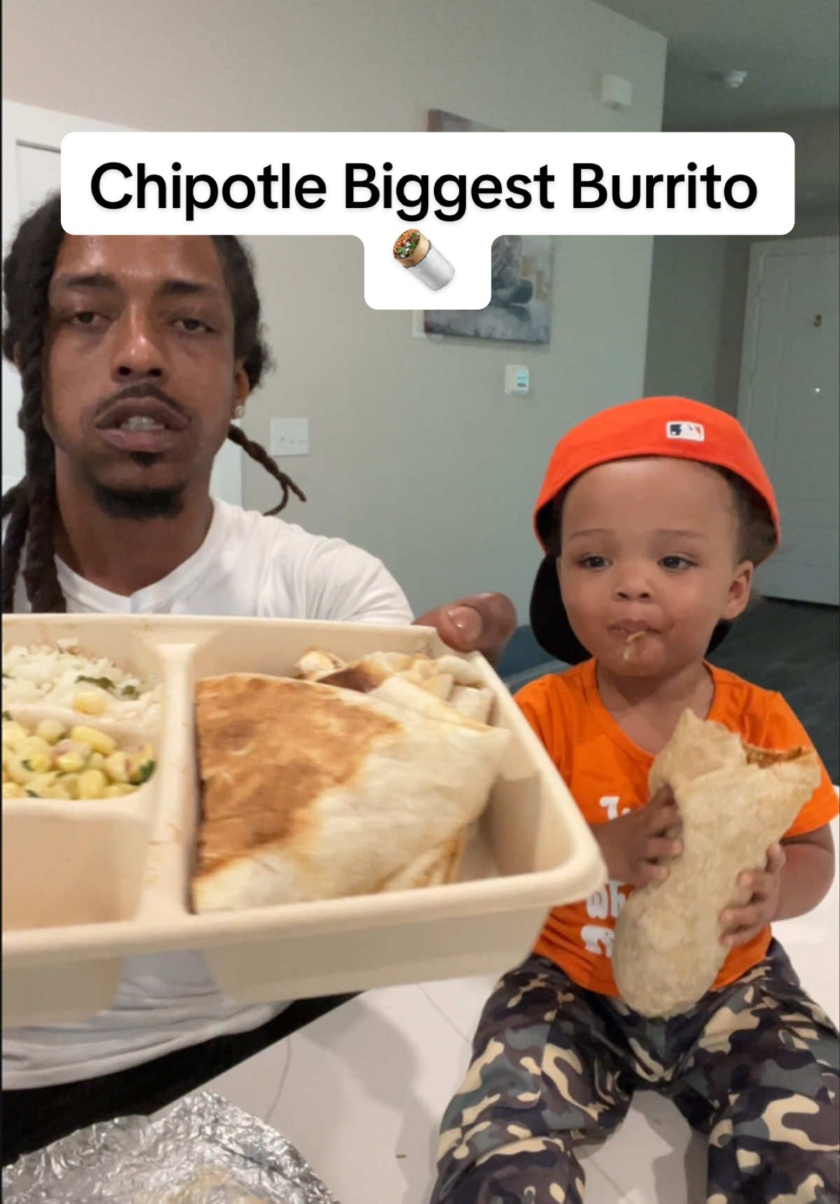 We got @Chipotle BIGGEST BURRITO 🌯 #foodcritic #mukbang #chipotle #burrito #fatherson #baby #MESSY #fyp 