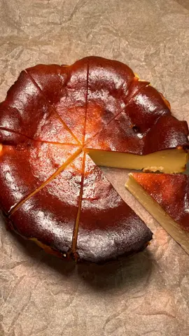 Basque Cheesecake 🧀 Ingredients: 6 or 7-inch pan with parchment paper.  16 oz cream cheese (~450 gm) 3 eggs 3/4 cup sugar (~150 gm) 3/4 cup cream (~200 ml) 1/4 tsp salt 1 tsp vanilla 3 tbsp all-purpose flour Note: Every ingredient is at room temperature. 1. Preheat oven to 450°F (230°C). 2. Mix in cream cheese and sugar. Whisk eggs one at a time. 3. Add cream, salt, and vanilla. Add flour (optional). 4. Bake on the middle rack of the oven for 50-55 mins or until the top part is very dark. Center should be jiggly, but edges should be set.  5. ⁠Let it cool at room temperature and cool in the fridge for at least an hour. #basquecheesecake #cheesecake #EasyRecipes #homecooking #baking #recipes #creamcheese 