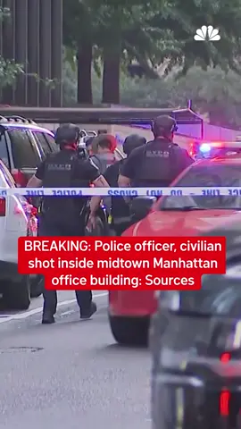 Police officer, civilian shot inside midtown Manhattan office building: Sources The shooting occurred in the lobby of 345 Park Avenue on East 52nd Street, an office building that records indicate is home to the NFL, Bristol Myers Squibb, Blackstone and KPMG. #breakingnews #manhattan 