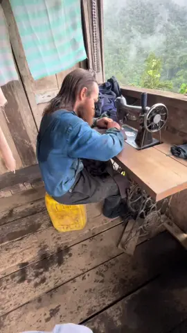 A pile of clothes need mended and patched good rainy day work #offgrid #homestead #sewing #sewingmachine #clothes 