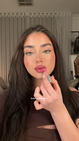 Toasty makeup >> products used:  @La Roche-Posay Hyalu B5 Eye Serum  @CeraVe moisturising lotion  @garnieraunz micellar water  @Armani beauty luminous silk foundation in shade  5.5 @Lancôme ultra wear all over concealer  @L’Oréal Paris lumi glotion  @NYX Professional Makeup face glue primer  @Maybelline NY lifter face stick 65 @lorealparis lumi le liquid blush in shade 635 @lorealparis infallible grip automatic liner in shade velvet  @maybellinenyc super lock brow gel  @nyxcosmetics_aunz white mechanical liner  @lorealparis panorama mascara @YSL Beauty powder blush in shade 54 berry bang  @Kérastase Elixir Ultime Refillable Hydrating Hair Oil ad #grwm #girltherapy #makeup #toastymakeup #girls   
