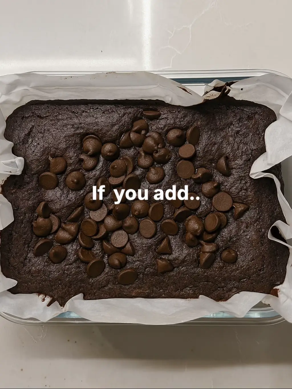 Ingredients: 2 ripe bananas (mashed) 1/2 cup Greek yogurt (plain or vanilla, high-protein) 1/3 cup peanut butter (natural) 2 tbsp honey (or maple syrup) 1/4 cup unsweetened cocoa powder 1 scoop of protein powder 1 egg  1 tsp vanilla essence 1/4 tsp salt 1/4 cup chocolate chips Method:  1. Preheat oven to 175°C (350°F). Line a small baking dish or loaf pan with baking paper. 2. In a mixing bowl, mash the bananas until smooth. 3. Add in the Greek yogurt, peanut butter, honey, cocoa powder, protein powder, vanilla, and salt. Mix until well combined. 4. Once combined add in egg mix it in. Fold in the chocolate chips. 5. Pour the batter into the prepared pan and spread evenly. Sprinkle extra choc chips on top. 6. Bake for 18–22 minutes 7. Let cool in the pan for 10 minutes, then remove and cool completely before slicing.