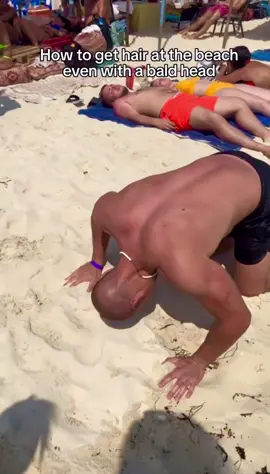 This hairstyle even suits him at the beach even with a bald head! 😆 How to get hair. A man with a bald head takes a playful dive into the sand at the beach. Moments later, he lifts his head and is suddenly covered in bright white hair. Everyone around bursts into laughter as the beach works its magic.  Sometimes, the simplest moments bring the biggest surprises. Appreciate the video of IG:salvatore.formicola_fit 📍Zanzibar, Tanzania #beach #vacation #zanzibar #travel