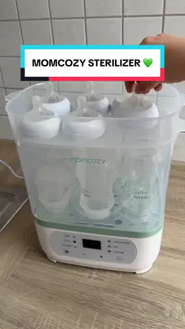 This is how I sterilize all our baby bottles with the @Momcozy Official sterilizer — quick, simple, and one less thing to stress about 🍼  As a new mom, anything that saves time and keeps things clean is a win 🙌🏻 If you're prepping for baby or figuring out your routine, this has honestly been a game changer 💛 👉 Save this if you're building your baby station or starting bottle feeding soon 🥰 #momcozy #bottlesterilizer #momcozysterilizer #nestingmama #babybottles  #newbornessentials #momlife  #babyrestock   