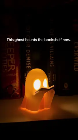 He’s chill, he glows, he’s 100% haunted. Perfect Halloween companion? Absolutely. #HalloweenCore #GhostlyVibes #BookTok #booktokfyp #halloweendecor 