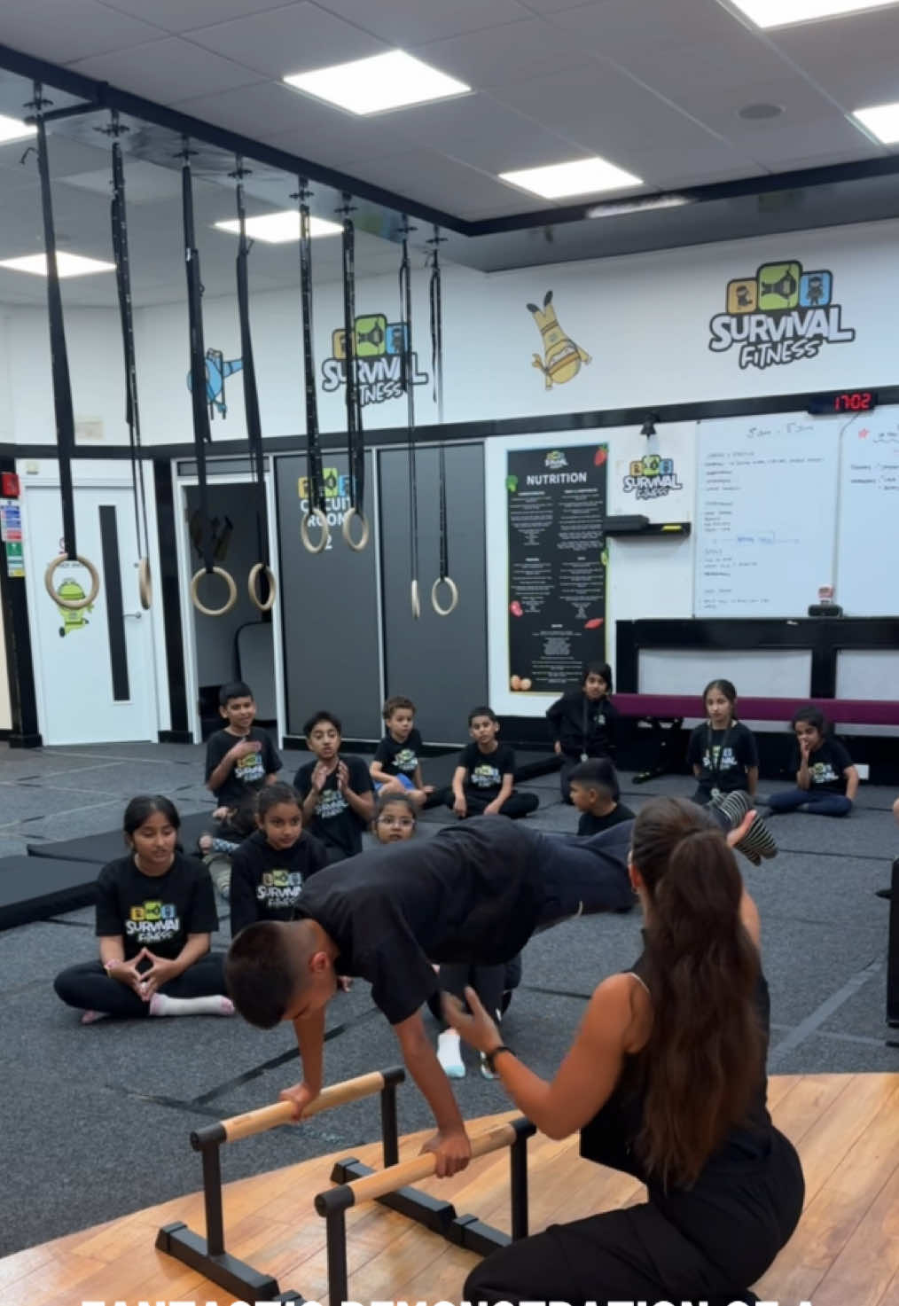 An amazing, thorough demonstration of a tuck planche into planche, some serious strength and control! 💪🏼 We encourage our children through these demonstrations, praising them, having them participate and motivating one another!💥  #SurvivalFitness #calisthenics #childrensfitness #childrenexcercise #tuckplanche #Fitness #fitnessmotivation 
