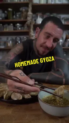 The easiest way to make these insanely delicious gyoza at home 🥟  ✨ Dough (Gyoza Wrappers) Ingredients: * 2 cups all-purpose flour * 125 ml warm water * 1 pinch of salt Method: 1. In a mixing bowl, combine the flour and salt. 2. Gradually add warm water while mixing. 3. Knead the dough for about 10 minutes. It will feel dry at first, but as you knead, it will come together. 4. The dough should be firm and slightly dry, not soft—this makes it easier to stuff and seal the gyoza. 5. Cover and let rest for 30 minutes before rolling and shaping. 🥬 Gyoza Filling (Vegan) Ingredients: * 1 cup red cabbage, finely shredded * 1 block firm tofu, crumbled (approx. 200 g) * 2 cloves garlic, minced * 1 small onion, finely chopped * 1 tbsp soy sauce * 1 tsp sesame oil * Salt and black pepper, to taste Method: 1. In a pan, heat sesame oil and sauté the onion and garlic until soft. 2. Add the shredded red cabbage and cook for 2–3 minutes. 3. Stir in the crumbled tofu and soy sauce. Season with salt and pepper. 4. Cook the gyoza until the mixture is dry (no excess moisture). 5. Let the filling cool before using. 🌶️ Spicy Peanut Chilli Oil Ingredients: * ½ cup hot oil (vegetable or neutral oil, heated until shimmering) * 1 tbsp peanut butter (smooth) * 1 tbsp red chilli flakes * 1 fresh red chilli, finely diced * 2 cloves garlic, minced * 1 tsp sesame seeds * 1 tbsp finely chopped chives * 2 tbsp soy sauce Method: 1. Place the peanut butter, chilli flakes, fresh chilli, garlic, sesame seeds, chives, and soy sauce into a heat-resistant bowl. 2. Carefully pour the hot oil over the mixture—it should sizzle. 3. Stir to combine and let it sit for a few minutes to infuse. 4. Use immediately or store in a jar for up to a week. Place the gyoza In a pan and cook the base until crispy then add 100-200ml water and cover with the lid until all the water evaporates 🥟🥬🌶️ #gyoza #餃子 #dumplings #japanesefood #asmr #japanese #gyozarecipe #fyp 