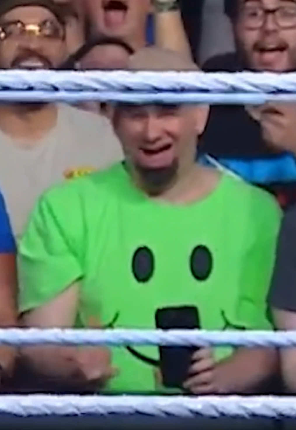 green shirt guy catching strays 🥀 #WWE #LoganPaul