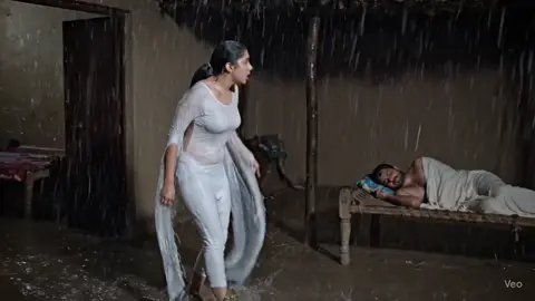 Desi Wife vs Rain | Emotional Village Scene #DesiVlog #PakistaniVillage #BarishScene #DesiCouple #SaraVlogs #VillageAesthetic #RainRomance #EmotionalScene #RealLifeDrama #RuralPakistan #ViralShorts #VillageRain #LoveAndDrama 