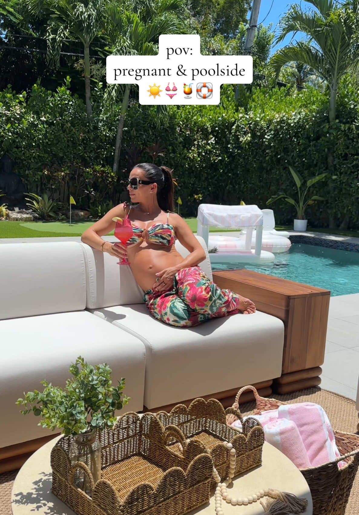 Poolside & pregnant calls for mocktails and the cutest outdoor setup!☀️👙 . Furniture is the Bora Collection Sectional and Orphia Table from @Rove Concepts  . #pooldays #poolsidedecor #pregnantandpoolside  #JourneysInTaste #OphiraCoffeeTable  