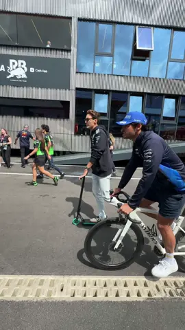 Cruising through the paddock 🛴🚲 #f1 #f1tiktok #hungariangp #carlossainz #georgerussell 