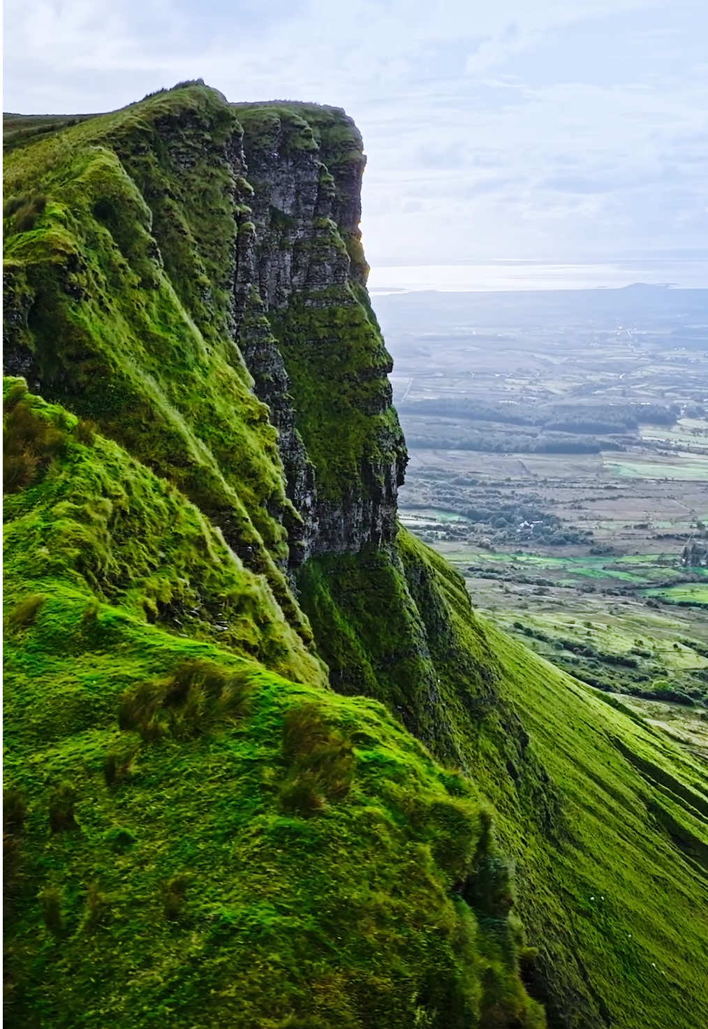 Sometimes, you have to stand at the edge to remember how far you’ve come~ . . . #DroneView #IrelandNature #MoodyLandscapes #WanderlustVibes #EdgeOfTheWorld #Dronelife #djimavic3cine #EpicViews #GreenEscape #NatureHealing #TravelWithDrone #AdventureVisuals #EarthFocus #IntoTheWild #DronePhotography #FilmmakerLife #PoeticEarth #TravelDeep 