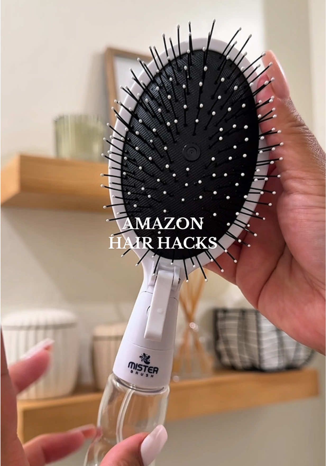 Hair hack: This 2-in-1 hairbrush with built in mister is perfect for styling wet or dry hair! 🤍  Everything is linked in my bio under “ Tiktok + Reels”  • #amazonfinds2025 #amazonfavorites #amazonbeauty #founditonamazon #amazonmusthaves 