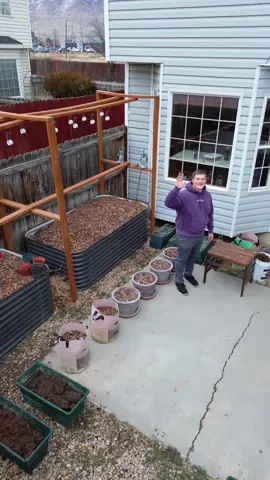 My backyard is actually closer to 15’x18’ but I feel like that is a harder number to visualize .  When I moved into my townhouse, the backyard was covered in weeds that were taller than the fence. I literally think it was the only backyard in the whole association that was unkempt like that lol.  After I removed the weeds it was just a concrete slab and two strips of dirt that bordered each side. I started my garden with the two steel beds and the rest is history! Each year I have tried to make it a little bit better and grow vertically.   What have you done to maximize your space?  #smallgarden #tinygarden #verticalgarden #growyourownfood #