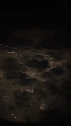 Soothing clouds, sleepy souls-flying through the quiet glow. 🌃✨  #airplane #flight #flights #inthesky #highinthesky #night #nightflight #nightflights #chill #relax #travel #clouds #cityatnight #nightsky #airplanewing #airplanewindow #airline #airlines #fly #flyatnight #ambient #ambientnight #dark #abovethecity #citylights #flightvibes #flyvibes #nightflight #traveltok #world#fyp #fypシ 