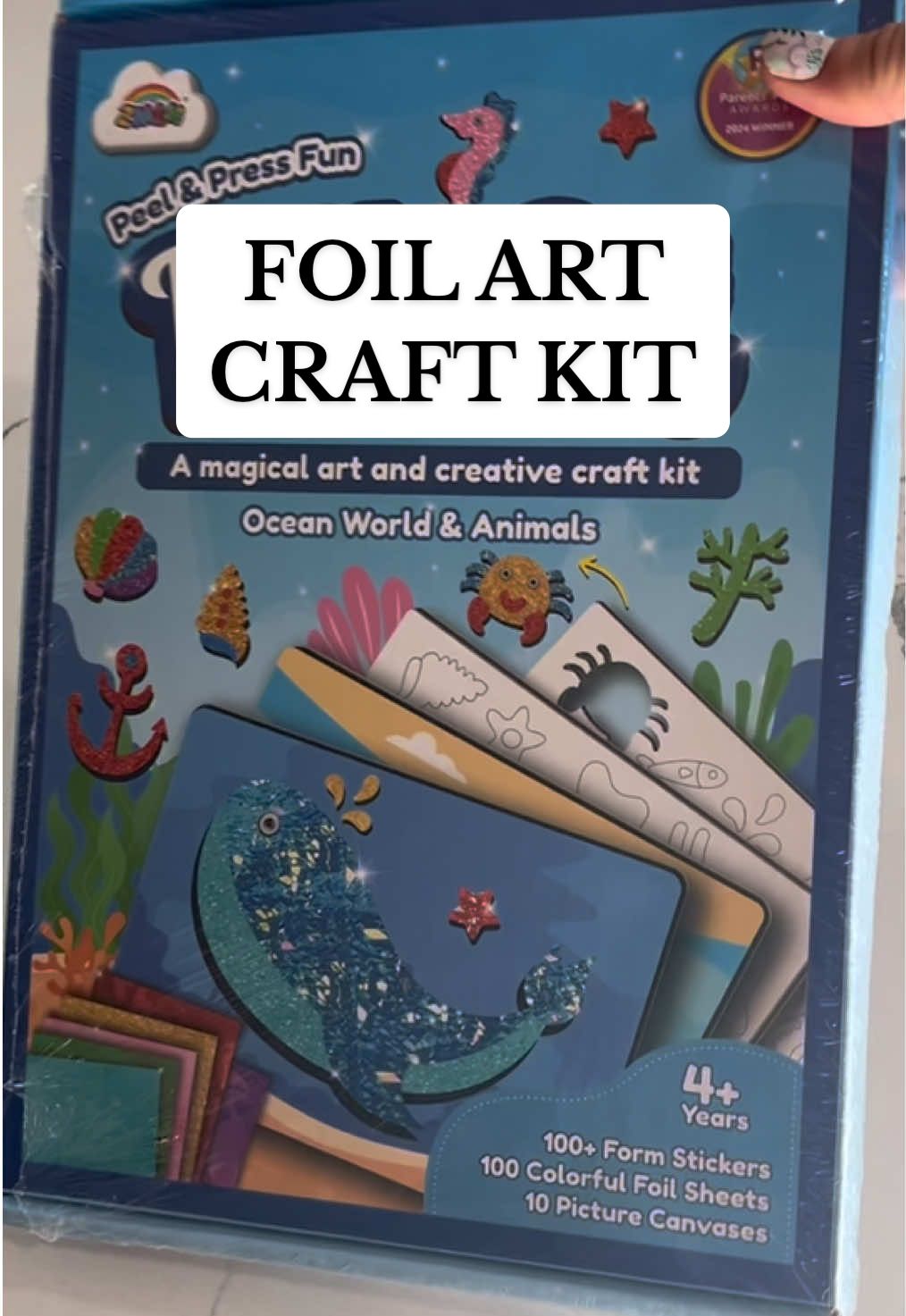 This ocean world and animals foil art kit provides hours of crafting fun! My toddler has used this kit several times. We usually will work on it while her younger sister is sleeping. The kit comes with 100+ foam stickers, 100 colorful foil sheets and 10 picture canvases.  #foilart #craftkids #toddlercrafts #preschoolcrafts #artandcrafts #artanscraftsforkids #giftideasforgirls #giftideasforkids #foilarttiktok 