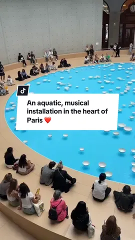 I absolutely loved this immersive and meditative installation in the heart of Paris! 🤍 Céleste Boursier-Mougenot’s “clinamen” invites guests to gather around a 92-foot-wide basin of water, where white ceramic bowls gently drift and collide, creating a delicate symphony of sound. The water  reflects the sky as seen through the museum’s dome. I visited on a rainy day, but inside of the Bourse de Commerce, it felt like a serene summer. Such a memorable moment of dreaming and reflection! Céleste Boursier-Mougenot’s “clinamen” is on view at the Bource de Commerce until September 21st. A voir absolument à Paris! 🇫🇷  #clinamen #boursedecommerce #CelesteBoursierMougenot #ImmersiveArt #contemporaryart  #ArtAndSound #thisisparis #pinaultcollection  #parismuseum best museum Paris