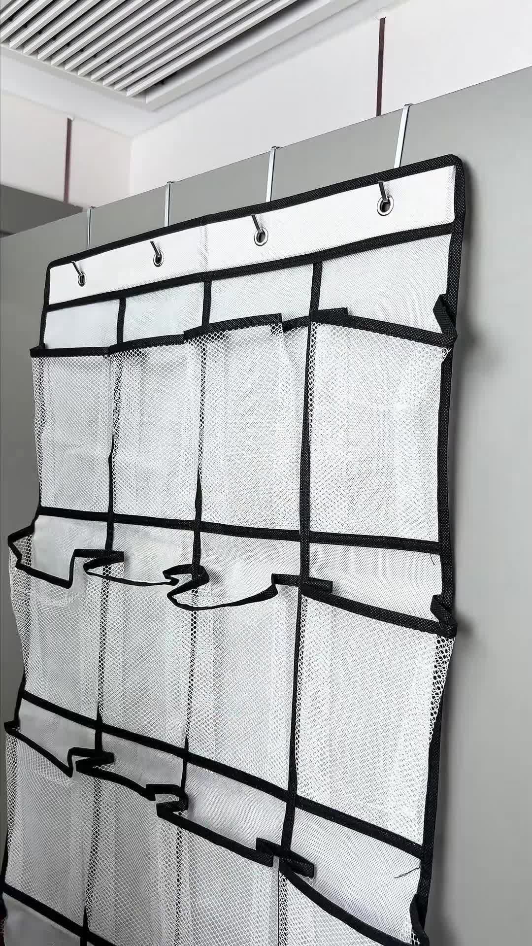 This over-the-door shoe organizer features 28 extra-large mesh pockets, serving as a practical hanging shoe rack. It efficiently organizes footwear, saving space with its door-mounted design, ideal for tidy storage.
 #shoes #homeorganization #shoeorganizer #overthedoororganizer #overdoororganizer #shoesorganizer #storageorganizer #tiktokshop #shop #shoppinghaul