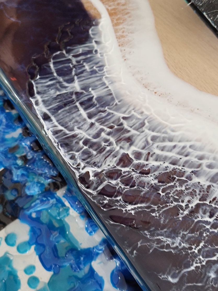 Relaxing epoxy ocean waves. . . . #resinart #asmr #viraltiktok #oceanwaves #charcuterie #cutttingboard 