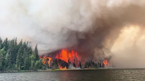 Aug long weekend was sure wicked!!!🔥🔥 : : : : : #scenery #wildfire #reindeerlake #fire #firefighter #helicopter #canada  