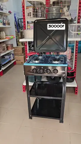 cuisinière à 4 feux avec table de rangement  #cuisinére #foyer #gaz #ustensiledecuisine 