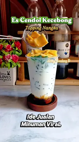 Es Cendol Kecebong Topping Nangka Ide Jualan Minuman Viral.    Bahan : - Jelly Cendol Kecebong -+2sdm - Gula merah cair -+30ml - Susu Evaporasi 100ml - Potongan buah nangka tuk topping - Es batu secukupnya  - Cup 16 Oz Injection  Cara membuat nya, lihat di vidio ya. Selamat mencoba. #Resepescendolkecebong  #Escendolkecebongviral  #Escendolviral #JellycendolArora  #Escendolkekinian #Minumanviral  #fypシ゚  #Fyp #fypage 