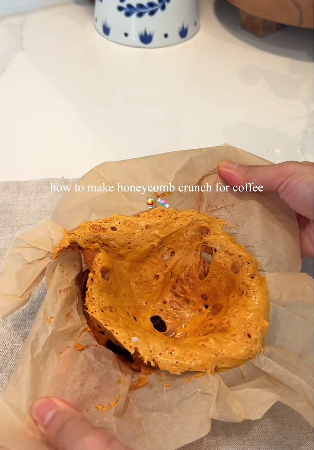 🍯 How to Make Honeycomb Candy  Mix 50g sugar + 25g water in a microwave-safe bowl. DO NOT STIR. Just swirl gently if needed. Microwave on high for 3 minutes. Check the color — if not caramel brown, heat in 10-sec intervals. Pour immediately into a bowl lined with parchment paper. Add 3g baking soda, and stir quickly. Watch it bubble and grow — this is the honeycomb magic! Let it cool completely. Smash into pieces and enjoy on top of your coffee or dessert! #HoneycombCandy #CoffeeTopping #EasyRecipe #MicrowaveHack #HomemadeTreats #SnackTok #BetterThanStoreBought#fyp #coffeerecipe 
