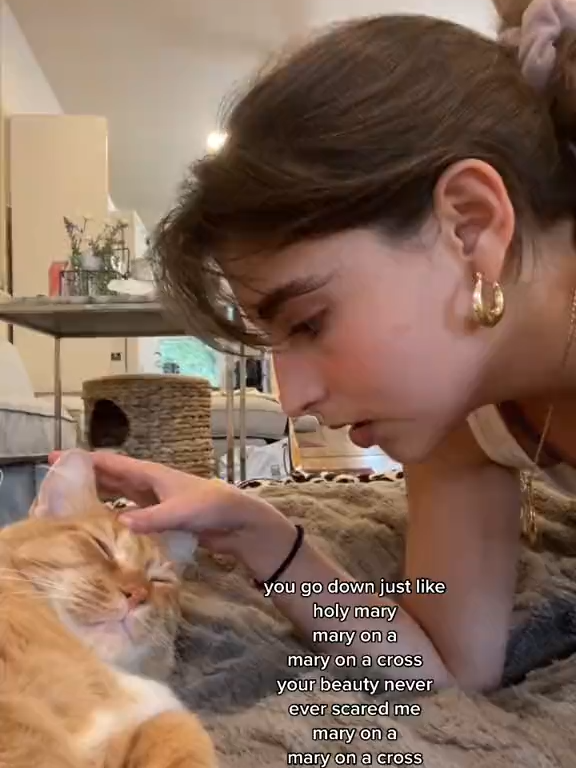 sometimes mr. boots likes it when j sing him to sleep…