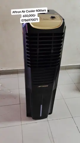 Aftron 40L Portable Air Cooler, model AFEAC4540B, also known as the Fresh Turbo 40.  Key Features: This is an evaporative air cooler with a 40-liter water tank, a Turbo mode for rapid cooling, and various other modes like Swing, Windy, Cool, and Power Saver. Cooling Performance: It covers an area of up to 15m² and includes a top ice compartment for enhanced cooling. Convenience: It features a digital control panel, remote control, anti-bacterial filter, removable dust filter, and caster wheels for easy mobility. #hot#Summer#appliances #fyp #ugandan #aircooler#windy#weather#season#dry weather#kampalatiktokers 