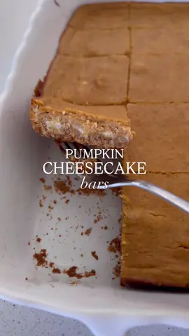 These Pumpkin Cheesecake Bars are creamy, spiced, and easier than pie 🎃🧀 A buttery crust + silky pumpkin cheesecake = the fall dessert everyone asks for 👏 📌 Save this for Thanksgiving, Friendsgiving… or any cozy night in! 🖨️ Find the more organized + printable recipe on Fantabulosity.com 💛 ▢ 3 cups graham cracker crumbs ▢½ cup unsalted butter ▢16 oz cream cheese (2 blocks) softened to room temperature ▢½ cup sour cream ▢1 cup granulated sugar ▢2 large eggs ▢1 teaspoon salt ▢1 cup pumpkin puree ▢2 ½ teaspoon pumpkin pie spice Instructions   Preheat your oven to 350 degrees F. Prepare a 9×13 baking dish with nonstick cooking spray and set aside. In a medium sized mixing bowl, melt the butter in the microwave and combine it with the graham cracker crumbs until it forms a wet, sandy mixture. Spread the graham cracker mixture evenly into the bottom of the 9×13 pan and press it down firmly to form a crust. Set the dish aside. In a large mixing bowl, use a hand mixer to whip the cream cheese until smooth. Now, mix in the sour cream and granulated sugar until they are fully incorporated. Then, add the eggs to the cream cheese mixture and mix once more until is smooth and the eggs are fully combined. Pour ¾ of the cheesecake mixture over the graham cracker crust. To the remaining cheesecake mixture, add the salt, pumpkin puree and pumpkin pie spice and mix it until combined. Dollop spoonfuls of the pumpkin cheesecake mixture all over the top of the plain cheesecake mixture. Use a butter knife to swirl the two mixtures together. Next, bake the cheesecake for 35-40 minutes or until the center is only slightly jiggly. Turn off the oven and allow the cheesecake to cool for 30 minutes in the oven. Then, put it in the fridge and allow it to cool for 1 ½ hours. Finally, cut the cooled cheesecake into squares, serve and enjoy! #pumpkin  #pumpkincheesecakebars #fallbaking #fallbakingi#fantabulositys#pumpkindessertbars #EasyRecipes #thanksgivingdesserts #tiktokbakes #cozyrecipes #makeagainmealse 