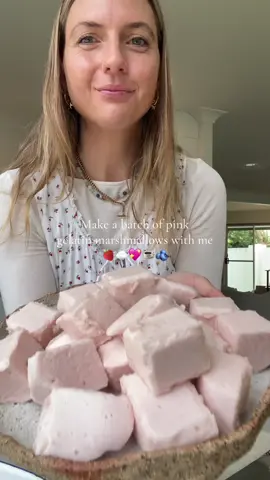 PINK GELATIN MARSHMALLOWS 💞 Gut loving marshmallows for the whole fam Ingredients: -2 cups of filtered water (divided) - 6 tablespoons of gelatin I used 4 tablespoons of natural gelatin and 2 tablespoons of mixed berry gelatin all from @Nutra Organics  - 1/3 cup maple syrup (could also use honey) - 1 teaspoon of vanilla extract (2 if you’re sexy IYKYK @Lilyloutay ) - pinch of Celtic sea salt  Method: - Pour 1 cup of water into a large mixing bowl and the other cup into a saucepan - In the mixing bowl sprinkle the gelatin over the water evenly, set aside to bloom  - in the saucepan add to the water the maple syrup, vanilla and Celtic salt, stir to combine and pop on the stove - leave to boil then reduce to simmer for a couple minutes  - once simmered grab your hand mixer or stand mixer if you’re fancy. I also am not sure about a thermo mix but give it a whirl and let me know!  - pour a little bit of the sauce pan mixture at a time into the mixing bowl and beating as you go. Pour and mix at the same time - once it’s all combined you’ll need to slave away with your beater I’m talking a solid 10-15 mins until its all fluffy and silky. - pour batter into a lined baking dish and refrigerate minimum 1hr. - cut into squares and store in an airtight container in the fridge. They will melt if not!  - soooo yum in coffee, hot cacao or just as a little sweet treat!   Voila enjoy! Let me know if you make it 💘💘 . . . . . #gelatinmarshmallow #homemademarshmallows #marshmallowrecipe #kidssnacks #toddlersnacks