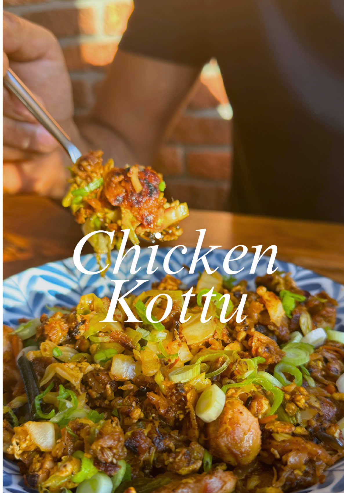 The Ultimate Sri Lankan Comfort Food - Chicken Kottu 🐔🍳🇱🇰 Got leftover chicken curry and some old rotis lying around from my last two reels? Time to turn them into something very special —Chicken Kottu! Think of it as Sri Lanka’s answer to egg fried rice, but with chopped-up roti, fiery curry, and that unmistakable street food energy. All mixed together with the distinct clatter of metal paddles on a hot plate.  Here’s how I do it: 1.  Heat oil in a pan, toss in a handful of sliced onions, greens, carrots and any other veg you like. Then scramble in an egg with a pinch of salt and pepper.  2. Add chopped-up leftover rotis (or Malabar parotta) and let them crisp up. 3. Pour in a small bowl of leftover chicken curry—gravy and all—mixing it in till the roti soaks up all that goodness. Add a splash of water or some more gravy if you need, but ensure you don't add to much liquid, turning it all to mush. Stir fry and chop it all up to bring it together on a high flame. #chicken #kothu #srilanka #india #south #chef #cookwithme 