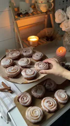 Pt 1 | What I’d bake all fall if I owned a bakery! Recipe below👇🏼 I know summer’s not over yet… but I just couldn’t wait to start autumn baking🍂✨ Gave a box of these to my neighbours and they LOVED them! 🤎 💌 Ingredients:  Dough * 280 g strong white bread flour (+ extra for dusting) * 30 g caster sugar (reserve 1 tsp for yeast activation) * ½ tsp salt * 7 g fast-action yeast * 75 ml warm milk * 2 eggs (room temp) * 50 g unsalted butter, softened * 2 tsp cinnamon Filling * 100 g unsalted butter, melted * 5 tbsp light brown sugar * 3 tsp cinnamon Glaze * 150 g icing sugar * 2–3 tbsp milk * ½ tsp vanilla 👩🏻‍🍳 Instructions:  1. Activate yeast – Warm milk, stir in 1 tsp sugar, sprinkle yeast, stir gently, rest 5–10 min until foamy. 2. Make dough – To the bowl with activated yeast, add flour, remaining sugar, salt, cinnamon, eggs, and softened butter. Mix to form a dough, then knead until smooth and elastic  3. First rise – Place in an oiled bowl, cover, proof 1 hr or until doubled. 4. Filling – Mix melted butter, brown sugar, cinnamon. 5. Shape – Punch down dough, roll to 1 cm thick rectangle, spread filling, roll tightly from long side, slice into 2–3 cm rounds. 6. Second rise – Arrange on parchment, lightly press down each roll to flatten slightly cover, proof 30 min until puffy. 7. Secure swirl – Before frying, insert a toothpick through each roll to hold the swirl in place 8. Fry – Heat oil and fry 1–2 min per side until golden. Drain. 9. Glaze – Mix icing sugar, milk, vanilla. Dip warm donuts, let set.  Enjoy! 🤎 #baking #donuts #fall #donutlover #glazeddonut #cinnamonroll #fallbaking #cozy #explore #baketok #dessert #autumn #aesthetic #trending #viral #fyp #bakingtherapy #pinterest #Recipe #EasyRecipe #fallvibes 
