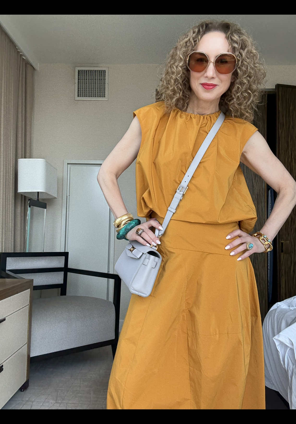 There are so many instances in life where girls are taught to speak quietly and not take up too much space in the room. It’s time my 58 year-old butt walks itself into the essence of who I am and embrace it. ✨ Also, a good clash of color is never a bad thing.… Italians know how to do it best just saying. 😉 #ForbesOver50 @Forbes  Set: Tibi  Shoes: Europe Purse: @Versace  Bangles: @Dinosaur Designs  Glasses: @Linda Farrow 