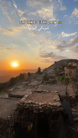 Shonke (ሾንኬ), nestled about 23 km from Kemise town in Dawa Chefa (Oromia Zone of Amhara), stands at approximately 1,600 m (5,200 ft) above sea level. The village boasts stone-built homes that blend beautifully into the rugged terrain—a captivating sight that truly makes it a “castle in the sky. A Historical Gem This ancient settlement is over 900 years old (as per the Islamic calendar) and served as a notable center for Islamic education and Sufi teaching in the 19th century. The revered Sufi scholar Shaykh Jawhar bin Haydar bin ‘Ali (c. 1837–1937), popularly known as the Shaykh of Shonke, lived and taught here, drawing students from across the region Heritage and Resilience: The village traces its Argobba inhabitants back to Arab refugees who sought sanctuary in Abyssinia centuries ago. Their legacy remains vibrant—highlighted by two ancient gates that once guarded the settlement, and still stand today as symbols of its fortified past.  challenges &change  Shonke’s residents have seen about half of the village’s households migrate downhill to farmlands in recent generations—shrinking from roughly 500 to roughly 250 households.Despite the hardships of steep terrain and limited infrastructure, many villagers hold dearly to their homes, their faith, and their way of life. As one longtime resident reflected, they “prefer our homes built of rock” and value the tradition over “shining cities”#shonkevillage #shonke #ethiopianmuslim #ethiopiantik  📍SHONKE VILLAGE ETHIOPIA