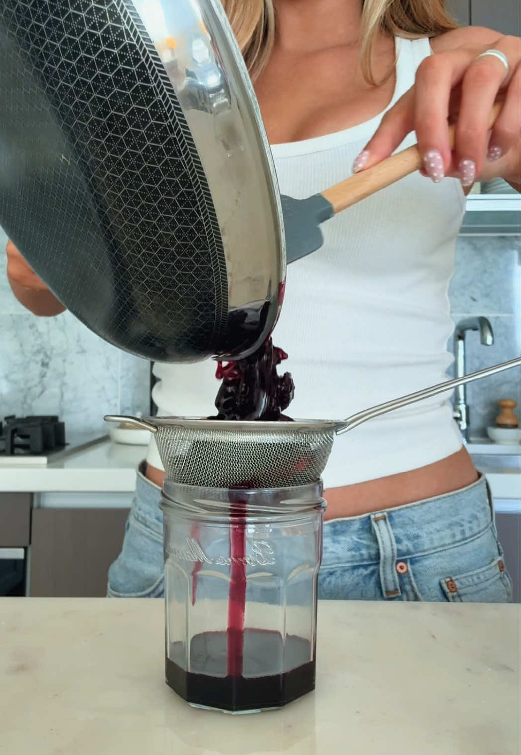 CHERRY SYRUP for ICED COFFEES! 2 cups frozen cherries and 1/4 cup sugar. Cook down until thickened 🍒 strain and it’s ready to use #cherry #cherries #coffee #syrup #fruit 