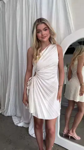 The dress we've all been dreaming of! 🥂🪩 Shop the Glow Ray One-Shoulder Pleat Dress in Champagne online now