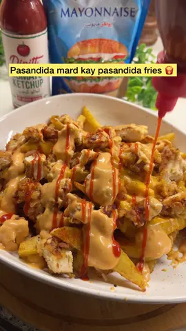 Cheesy Loaded fries for my pasandida mard 🍟  Loaded Fries Recipe 🍟🧀 Chicken Marinade: 	•	2 chicken breast pieces 	•	1 tsp garlic paste 	•	1 tbsp @shangrilapakistan Sriracha sauce 	•	1 tbsp olive oil 	•	½ tsp black pepper 	•	½ tsp salt 	•	1 tsp chili powder 	•	½ tsp oregano Coating: 	•	Bowl 1: 1 cup all-purpose flour + pinch of salt, black pepper, chili powder 	•	Bowl 2: 1 egg + 1 cup milk + pinch of salt 	•	Coat chicken → flour → egg mix → flour again (KFC style!) → deep fry until golden → cut into cubes. Fries: 	•	Fresh potato fries, cooked 6–7 mins on low flame, then high flame till crispy. Sauce: 	•	½ cup @youngsfoodpk mayonnaise 	•	1 tbsp @dipittofficial @dipittinternational tomato ketchup 	•	½ tsp mustard sauce 	•	2 tbsp @shangrilapk Sriracha sauce 	•	4 tbsp milk 	•	Green jalapeños (sliced) Mix well till smooth. Assembly: 	•	Layer crispy fries, top with chicken cubes, drizzle sauce, add melted @adamsmilkfoods sandwich cheese slices 🧀, and extra jalapeños. Pure loaded fries happiness! ❤️ #Loadedfries #food #foodblogger #EasyRecipe #homemade #kpkfoodblogger #pakistaniblogger #fyp #viral