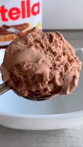 Creamy and rich ice cream swirled with luscious Nutella for a smooth, chocolate-hazelnut delight. #icecream #nutella #chocolate #sweet #cookies #trending #foryou #viralvideo 