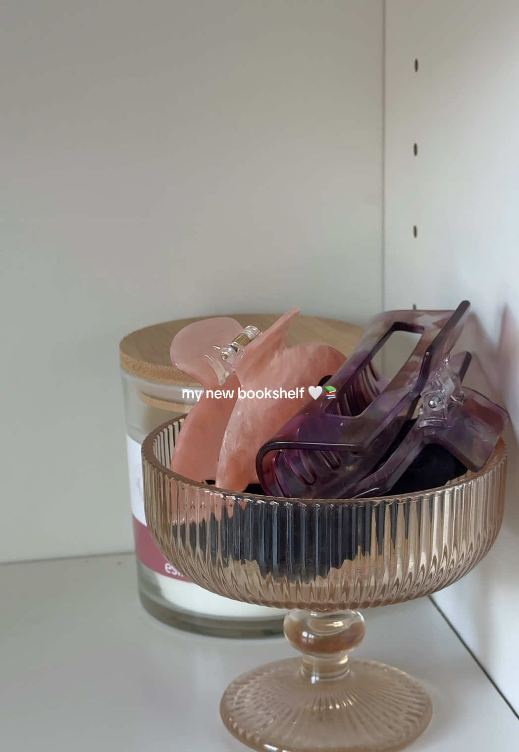 trying to go for a colorful Pinterest kinda vibe so this is what I’ve come up with so far! #bookshelf #books #aesthetic #pinterestapartment #apartmentdecor #pinterest #collegeapartment 