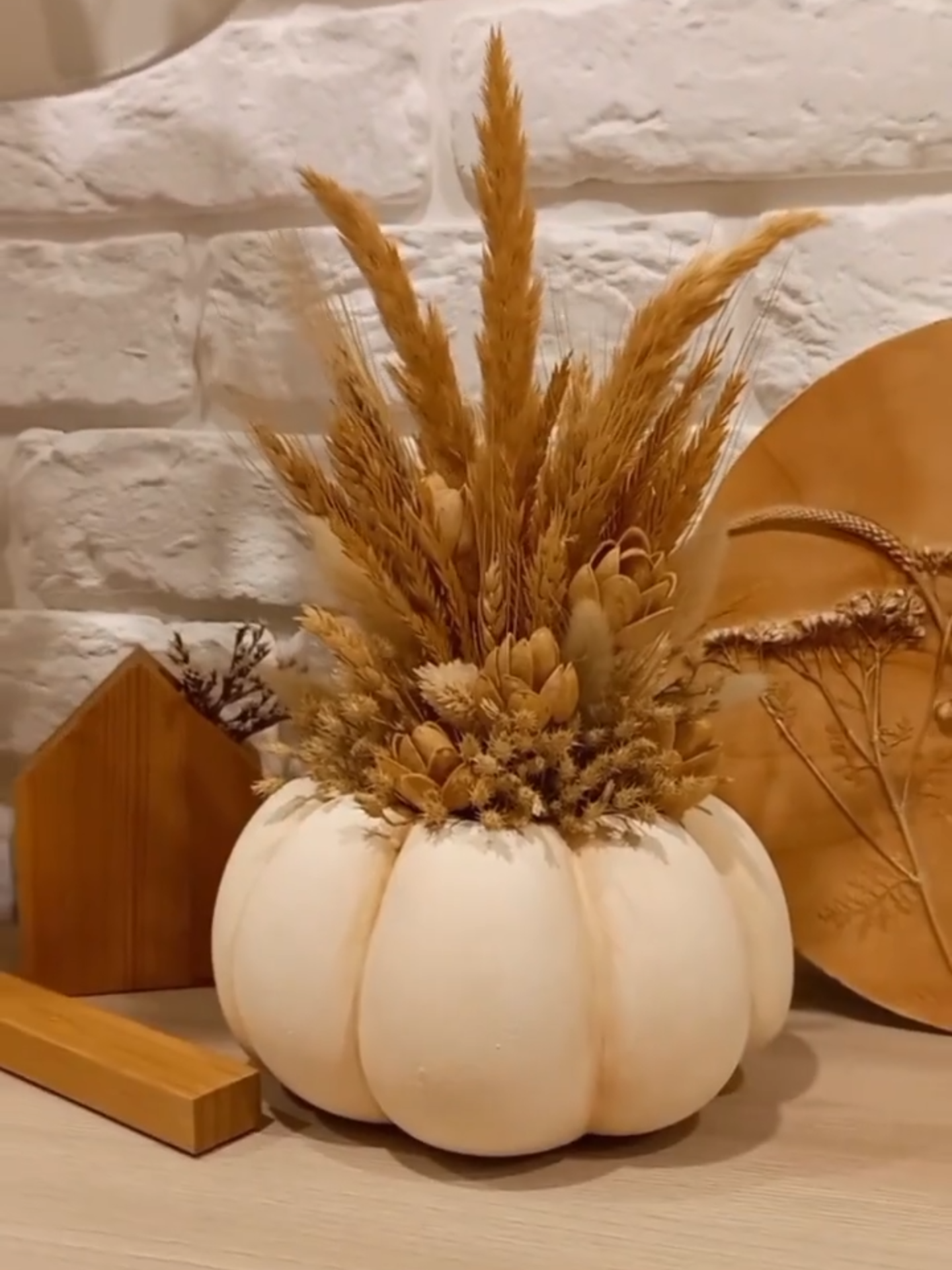 DIY pumpkin decoration with a hole inside for candles or dried flowers Credit: _kudinovaolga_