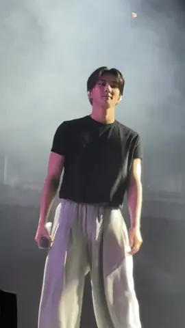 Jungwon in a black shirt and grey pants #JUNGWON #enhypen #engene 