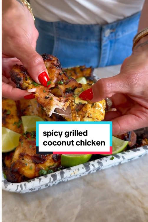 GRILLED SPICY COCONUT CHICKEN THIGHS-juicy, smoky, and just the right amount of heat (don't worry, kids can eat this too!!). These grilled spicy coconut chicken thighs are pure summer perfection. Marinated in creamy coconut milk, sambal oelek, ginger, garlic, and lime, they're bursting with flavor in every bite. The grill gives them that irresistible char, while the coconut keeps them tender and JUICY. Serve them with chopped cilantro, a squeeze of lime, and the marinade that also doubles as a dipping sauce, and you've got lots of protein that's downright addictive . Make it and come back and tell me what you think! Comment BLENDER or LINK and I will DM you the link to my most used blender! Makes 6 servings 2 lbs boneless, skinless chicken thighs Marinade/Sauce 115 oz can unsweetened coconut milk 2 tb olive oil 1/2 cup sambal oelek 1 tb fresh ginger, grated (or 2 tsp dried ginger) 6 cloves garlic 1/4 cup coconut sugar 1/3 cup fresh lime juice (2 limes) 2 tsp kosher salt Garnishes: Chopped cilantro Lime wedges Chili crisp In a blender, add all of the ingredients for the sauce/ marinade and blend until smooth. Pat chicken dry and add to a large bowl. Pour 3/4 of the sauce over the chicken and save the rest to use as a dipping sauce later. Cover bowl and let marinate for at least 30 minutes. Turn grill on to 450F. Spray grill grates with avocado oil spray. Once the grill is 450F, add the chicken. Do not touch for 7 min. Then flip to the other side and do not touch for 6-7 minute more, or until the internal temp reaches 165F. Let the chicken rest for 5 minutes, then garnish with cilantro and lime wedges. Serve with remaining sauce and chili crisp for extra heat, if desired. Enjoy! #chicken #chickenrecipes #highprotein #summergrilling #grilling