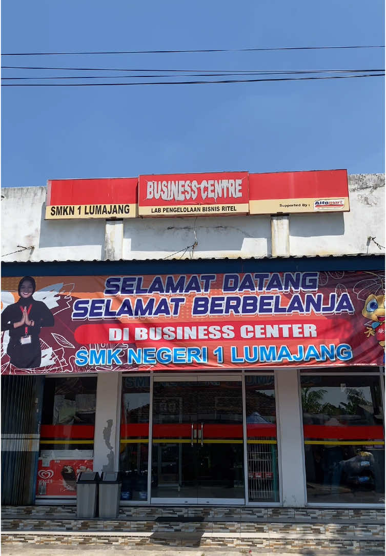 TEMPAT BERBELANJA MURAH, LENGKAP, DAN BERKUALITAS?  Cari tempat berbelanja yang menawarkan harga murah, produk lengkap, dan kualitas terjamin? 🏷️👀 SMK Negeri 1 Lumajang punya solusinya💡  Dengan harga yang kompetitif dan produk yang lengkap, Business Center kami menawarkan pengalaman berbelanja yang menyenangkan dan memuaskan  Dari makanan ringan hingga kebutuhan sehari-hari, semuanya tersedia di sini! 🍿🛍️ Tidak hanya itu, Business Center SMK Negeri 1 Lumajang juga menjamin kualitas produk yang dijual. Kami berkomitmen untuk menyediakan produk-produk yang segar, baru, dan berkualitas tinggi✨ Jadi, tunggu apa lagi? Kunjungi Business Center SMK Negeri 1 Lumajang dan rasakan pengalaman berbelanja yang murah, lengkap, dan berkualitas🤩 #SMKNegeri1Lumajang #BusinessCenter #BerbelanjaMurah #BerbelanjaLengkap #BerbelanjaBerkualitas