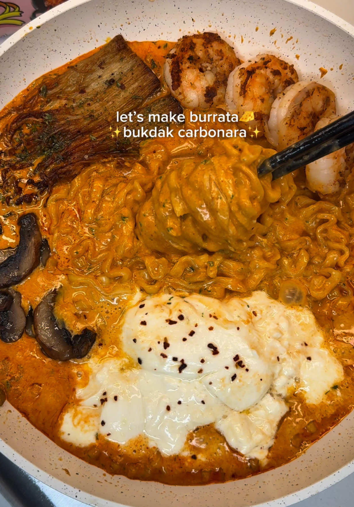 This ain’t your average Buldak Carbonara 🍝 Crispy enoki × creamy burrata × spicy Buldak = flavor explosion 🔥🍄‍🟫🧀 Rich, spicy, and packed with textures that’ll have you twirling your fork nonstop 🍝✨🍽️ One bite and it’s instant obsession💗 📍 Tag your noodle buddy & save this for your next comfort food night🔥 ✨ Hailey’s Mushroom Burrata Buldak Carbonara ✨ Ingredients 	•	1 pack Buldak Carbonara ramen 	•	½ cup heavy whipping cream 	•	1 burrata cheese 	•	⅓ pack enoki mushrooms (washed) 	•	2 baby bella mushrooms, thinly sliced 	•	1 tbsp butter 	•	1 tbsp cooking oil 	•	Crushed pepper, to taste ⸻ Instructions 	1.	In a pan, melt the butter, add the mushrooms, drizzle with cooking oil, and sauté until golden brown and crispy. Set aside. 	2.	In a pot, cook the noodles until just undercooked. Drain and transfer to the pan. 	3.	Add the red sauce and powder seasoning from the Buldak pack, along with the heavy cream. Simmer until slightly thickened. 	4.	Top with the sautéed mushrooms and burrata cheese 🧀. 	5.	Finish with a sprinkle of crushed pepper and parsley (optional). #asmrfood #mukbang #buldakcarbonara #enokimushroom #fyp @Buldak 