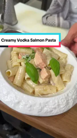 Eat or Pass? Creamy Vodka and Salmon Rigatoni 🐟 Ingredients x2 servings - cooking cream 260g  - 1 1/2 shallots (finely chopped)  - 1/2 clove garlic grated - 250-300g salmon (diced)  - 6 boiled asparagus (cut into larger pieces) - Nutmeg a pinch  - 60g butter  - 1 tbsp vodka*  - 1 1/2 tbsp semi-dry white wine*  - Parmesan (garnish) - 60 ml pasta water  - Pasta (Rigatoni - pappardelle - tagliatelle) Process 1. Boil the pasta according to the package.  2. Add the butter and shallots at once and cook until transparent. Meanwhile add the garlic.  3. Add the cooking cream, salt, black pepper, nutmeg, asparagus and salmon.  4. Once it starts to boil add the vodka and wine. Cook until it thickens over medium heat, maximum 10 minutes.  5. Drain the pasta water, stir and add the cooked pasta.  6. Stir and cook for another 2-3 minutes. Serve with grated parmesan and basil leaves.  TIPS *For children skip the vodka and wine. 🇷🇴👇 Ingrediente x2 portion - smântână de gătit 260g  - Ceapă esalot 1 1/2 (tocată fin)  - Usturoi 1/2 cățel ras - Somon 250-300g (tăiat cuburi)  - Sparanghel fiert 6 buc (tăiat bucăți mai mari) - Nucșoara un vârf de cuțit  - Unt 60g  - Vodka* 1 lingură  - Vin* alb demi sec 1 1/2 lingură  - Parmesan (decor) - Apă de pe paste 60 ml  - Paste (Rigatoni - papardele - tagliatelle) Proces: 1. Fierbeți pastele conform ambalajului.  2. Puneți untul și ceapa esalot deodată și gătiți până când este transparentă. Între timp adăugați și usturoiul.  3. Adăugați smântâna, sarea, piperul negru, nucșoară, sparanghelul și somonul.  4. După ce începe să fiarbă adăugați vodka și vinul. Haiti până când se îngroașă la foc mediu, maxim 10 minute.  5. Puneți apă de pe paste, amestecați și adăugați pastele fierte.  6. Amestecați și mai gătiți încă 2-3 minute. Serviți cu parmezan ras și frunze de busuioc. TIPS: *Pentru copii omiteți vodka și vinul. #recipes_by_joseph_hadad  #creatorsearchinsights 