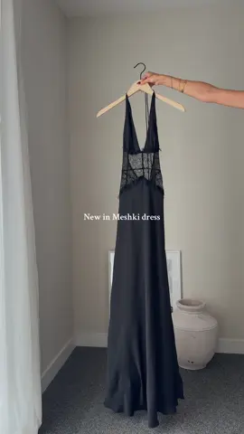 Styling a back lace maxi dress 🖤 This satin halter neck style with delicate lace detail and an open back is the perfect mix of chic and timeless. Outfit links on my LTK #maxidress #dress #eveningdress #lacedress #backless #satin #blackdress #outfitinspo #fashion #satindress #newdress #weddingguestdress 