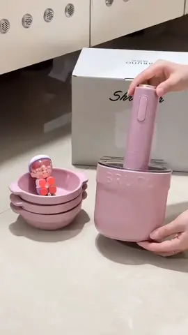 Một máy nhiều công dụng có thể xay thịt, xay gia vị và bóc vỏ tỏi. Bộ máy xay thịt thố sứ.